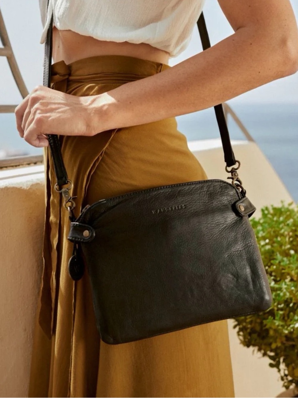Venetian Passport black leather crossbody purse